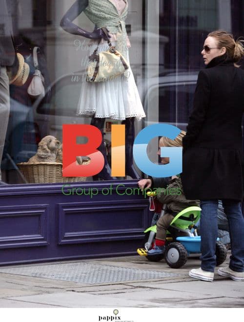 Stella McCartney Pushes Baby Miller in Trike