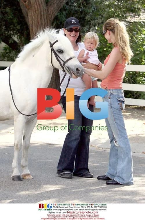 Denise Richards Bonds with Horses at New Home