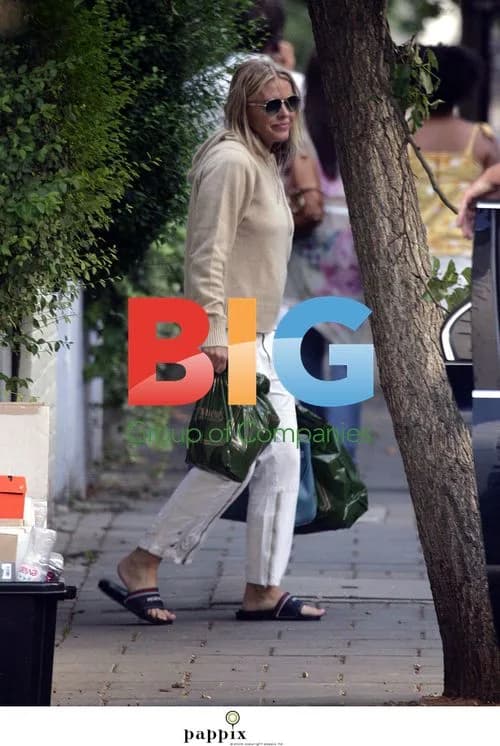 Patsy Kensit Leaves Home in Baggy Jumper