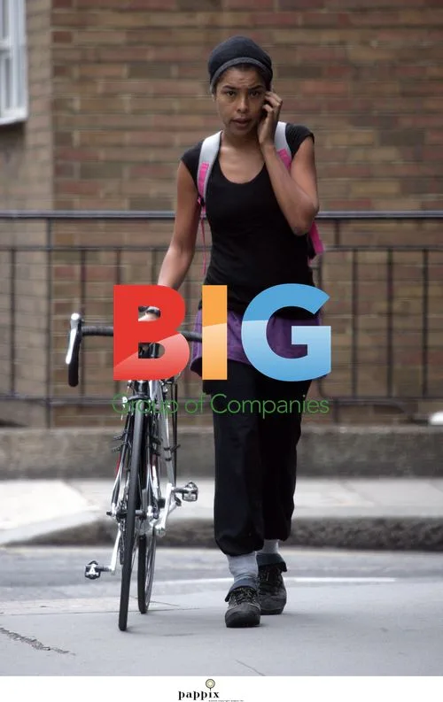 Sophie Okonedo Riding Bicycle in London