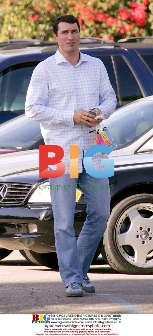 Wladimir Klitschko receives soft toy from Lucy Liu