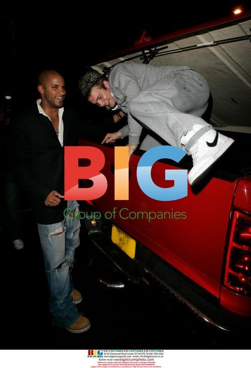 Ricky Whittle helps Chris Fountain into his truck