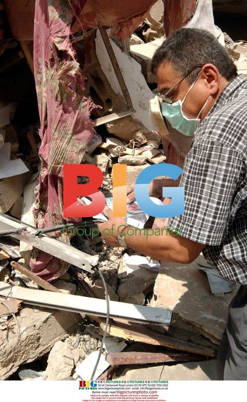 Family finds photos in apartment rubble