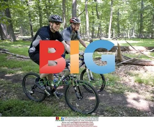 Bush and Rasmussen bike at Camp David