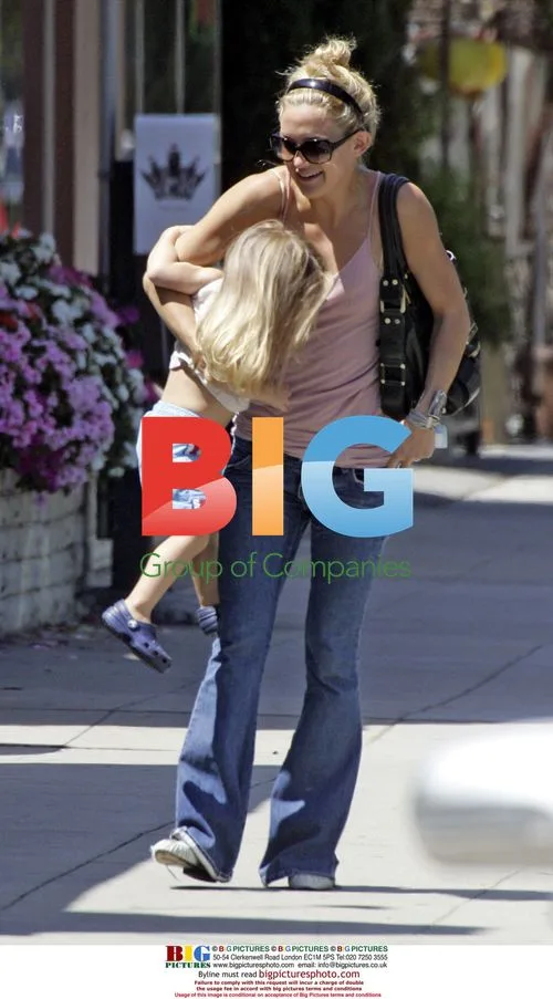Chris Roberson and Kate Hudson out with son Rider