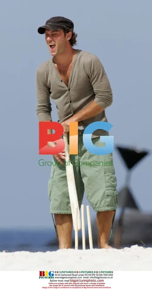 Jude Law plays cricket on the beach with son Rafferty