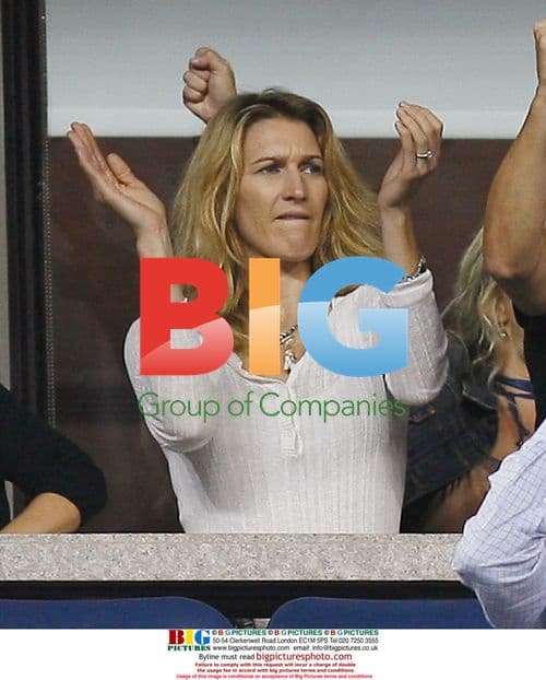 Steffi Graf reacts as Agassi wins second set