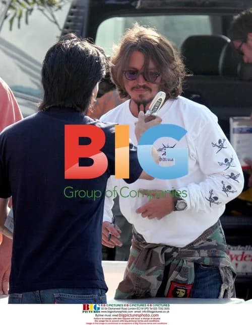 Johnny Depp Signing Autographs on Pirates Set