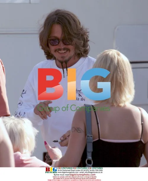 Johnny Depp Signing Autographs on 'Pirates' Set