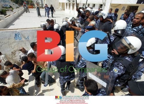 Riot police block protesters from Palestinian parliament