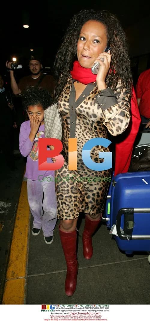 Melanie Brown Arrives at LAX