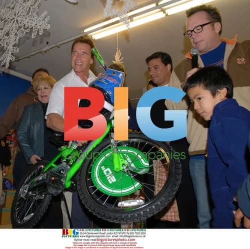 Arnold Schwarzenegger and Tom Arnold at Charity Event