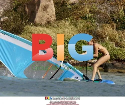 Gisele Bundchen Windsurfing in Caribbean