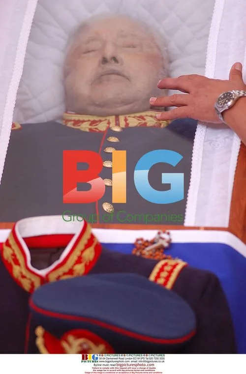 Pinochet supporter touches coffin in Chile
