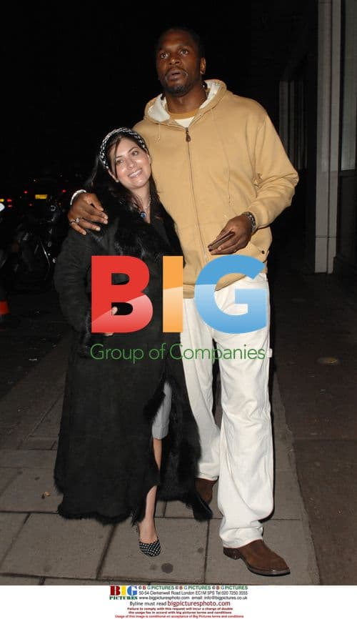 Boxer Audley Harrison and partner leaving club