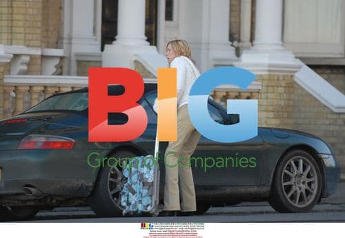 Heather Mills seen with dog and suitcase