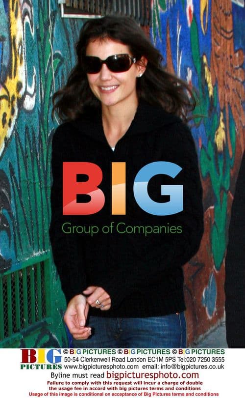 Katie Holmes Celebrates Birthday Helping Needy Family