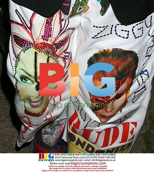 Boy George Poses for Cameras in London