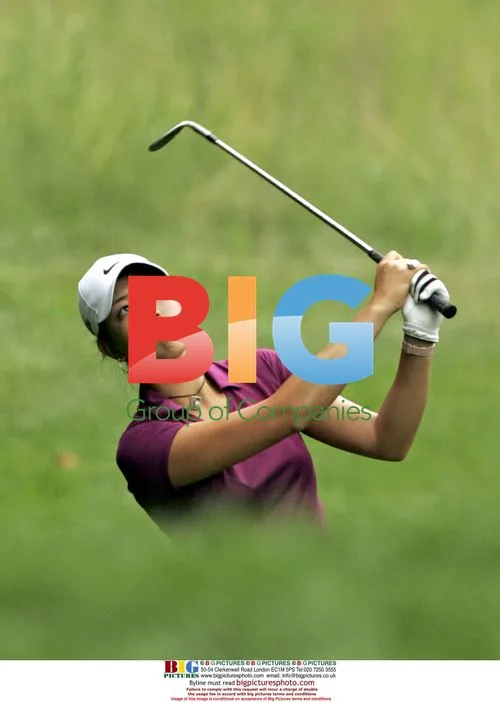 Michelle Wie Hits Out of Rough at John Deere Classic