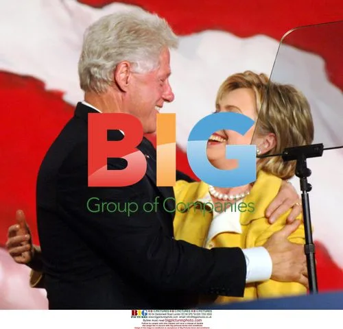 Hillary Clinton Embraced by Bill Clinton