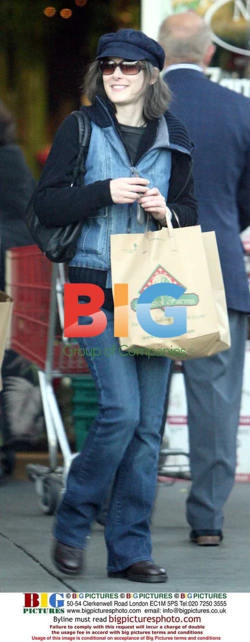 Winona Ryder and Mystery Man Out in West Hollywood