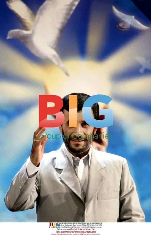 Ahmadinejad Waves at Press Conference in Tehran