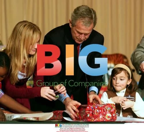 George W. Bush Helps Wrap Christmas Gift