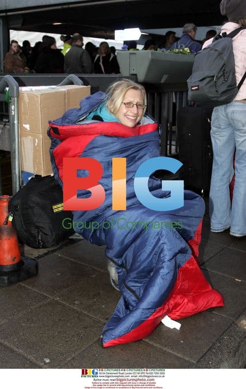 Passengers at Heathrow Airport during Fog