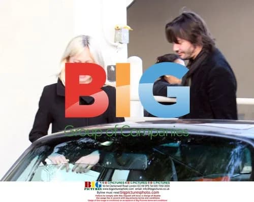 Keanu Reeves goes shopping with blonde friend