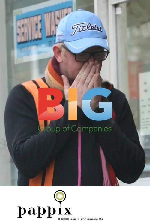 Chris Evans spotted grooming dog in street