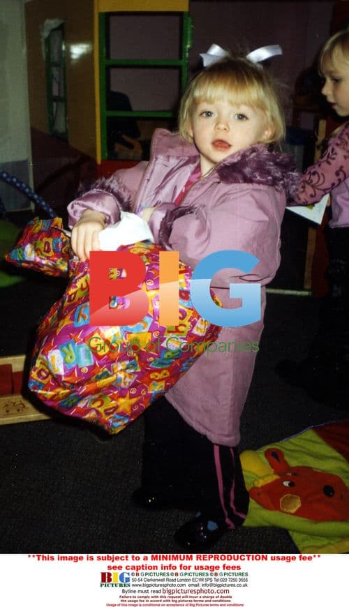 Chloe holds large birthday present