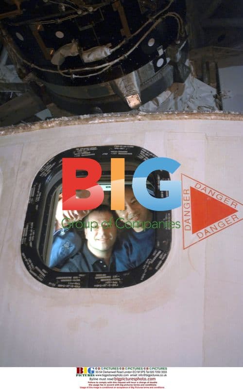 Astronauts on the Space Shuttle Discovery