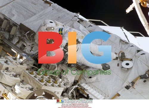 Astronaut Christer Fuglesang uses camera during EVA