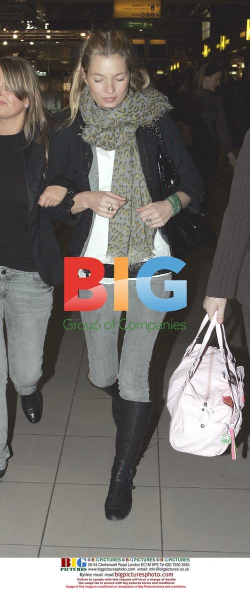 Kate Moss Departs Heathrow for Holiday