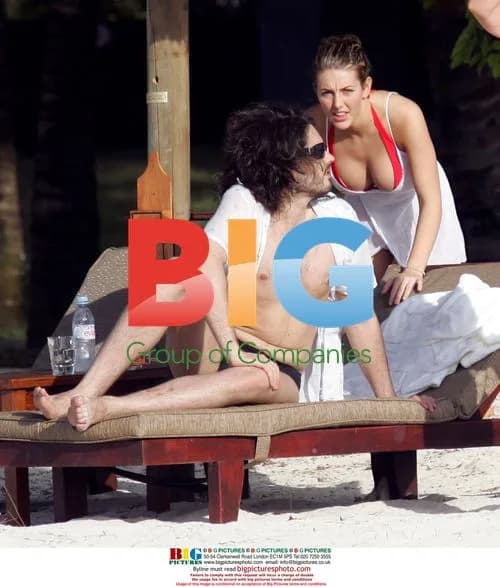 Russell Brand with mystery woman and mom