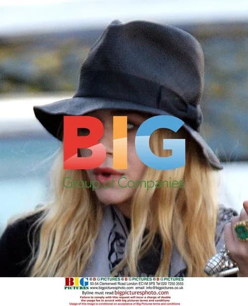 Mary-Kate Olsen Gets Help to Car on Melrose