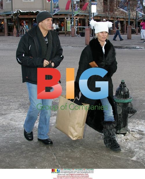 Nicollette Sheridan and Michael Bolton Christmas shopping in Aspen