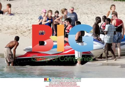 Simon Cowell celebrates X-Factor victory in Caribbean