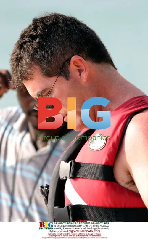 Simon Cowell enjoys X-Factor win in Caribbean