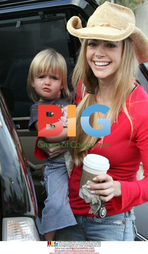 Denise Richards grabs coffee at Starbucks