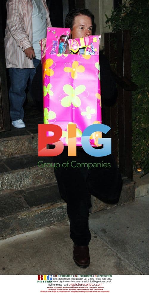 Mark Wahlberg Carrying Gifts at Koi Restaurant