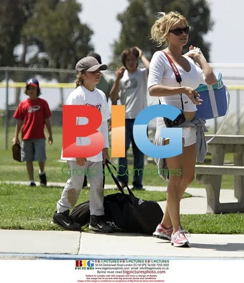 Pamela Anderson Cheers On Sons at Baseball Game
