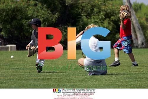 Pamela Anderson Watches Kids Play Baseball