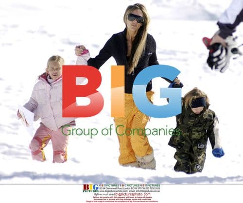 Victoria Beckham and son Romeo enjoy snow activities