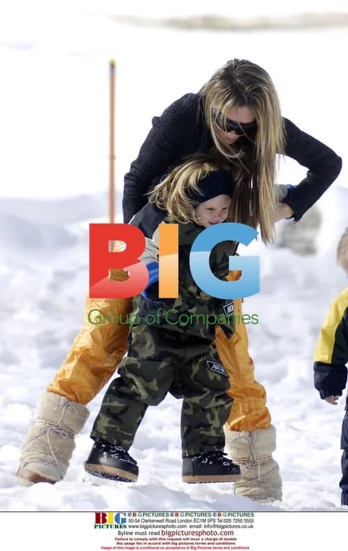 Victoria Beckham and son Romeo enjoy snow day