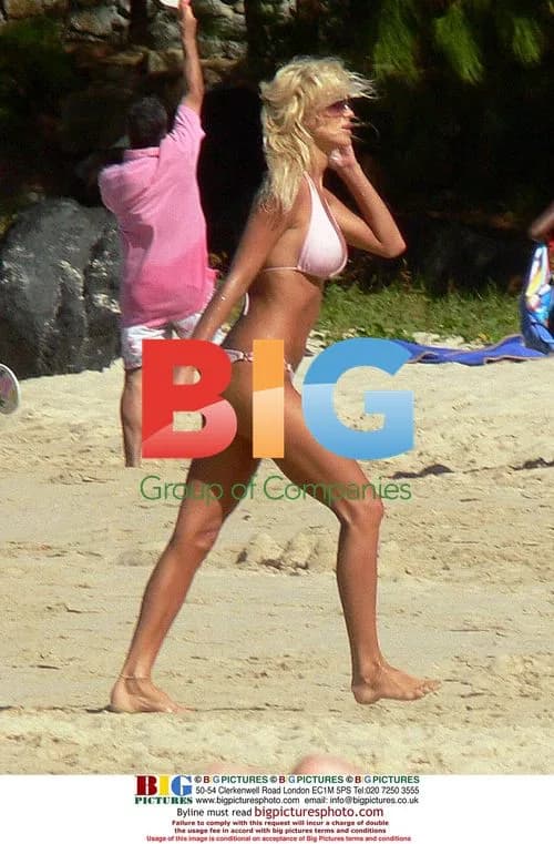 Victoria Silvstedt Relaxing on Caribbean Beach