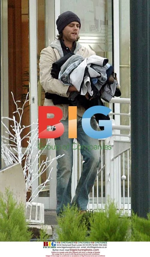 Brian McFadden and Delta Goodrem Spotted Leaving Hotel