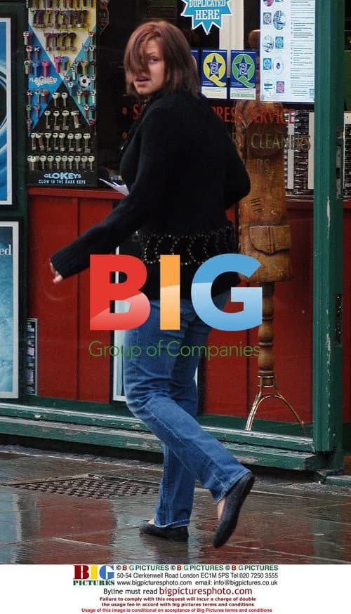 Jade Goody and Carly Walpole Brave Rain for Bank Visit
