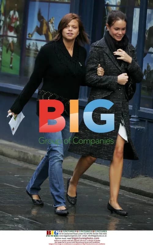 Jade Goody and Carly Walpole brave rain to visit Jade's salon