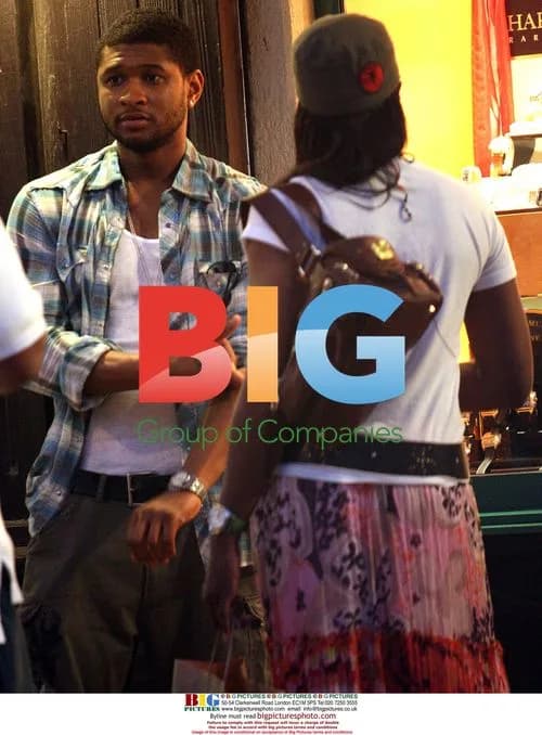 Usher seen shopping with girlfriend in Caribbean